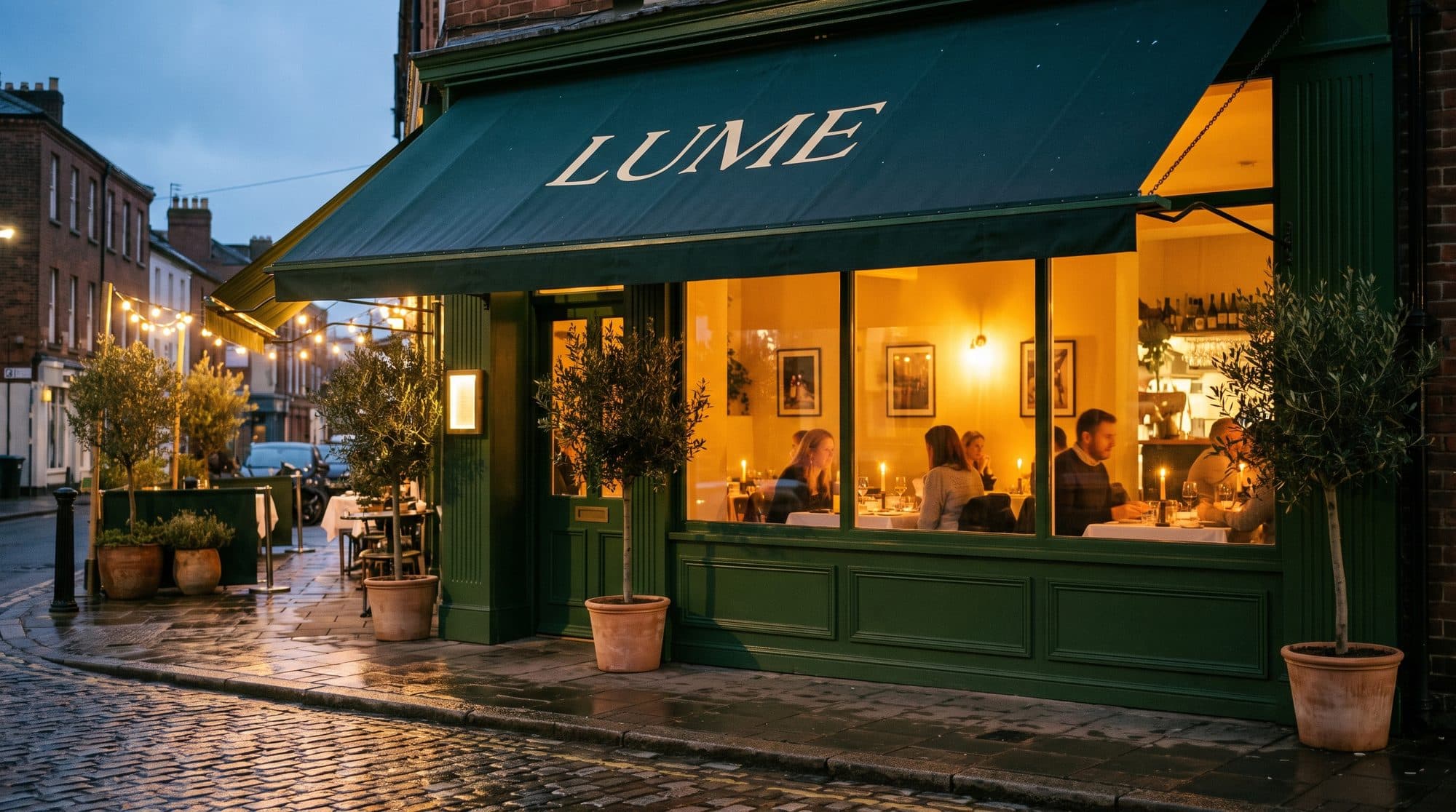 Osteria Lume's storefront at dusk
